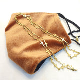 Cuelgamascarillas o cuelgagafas cruces